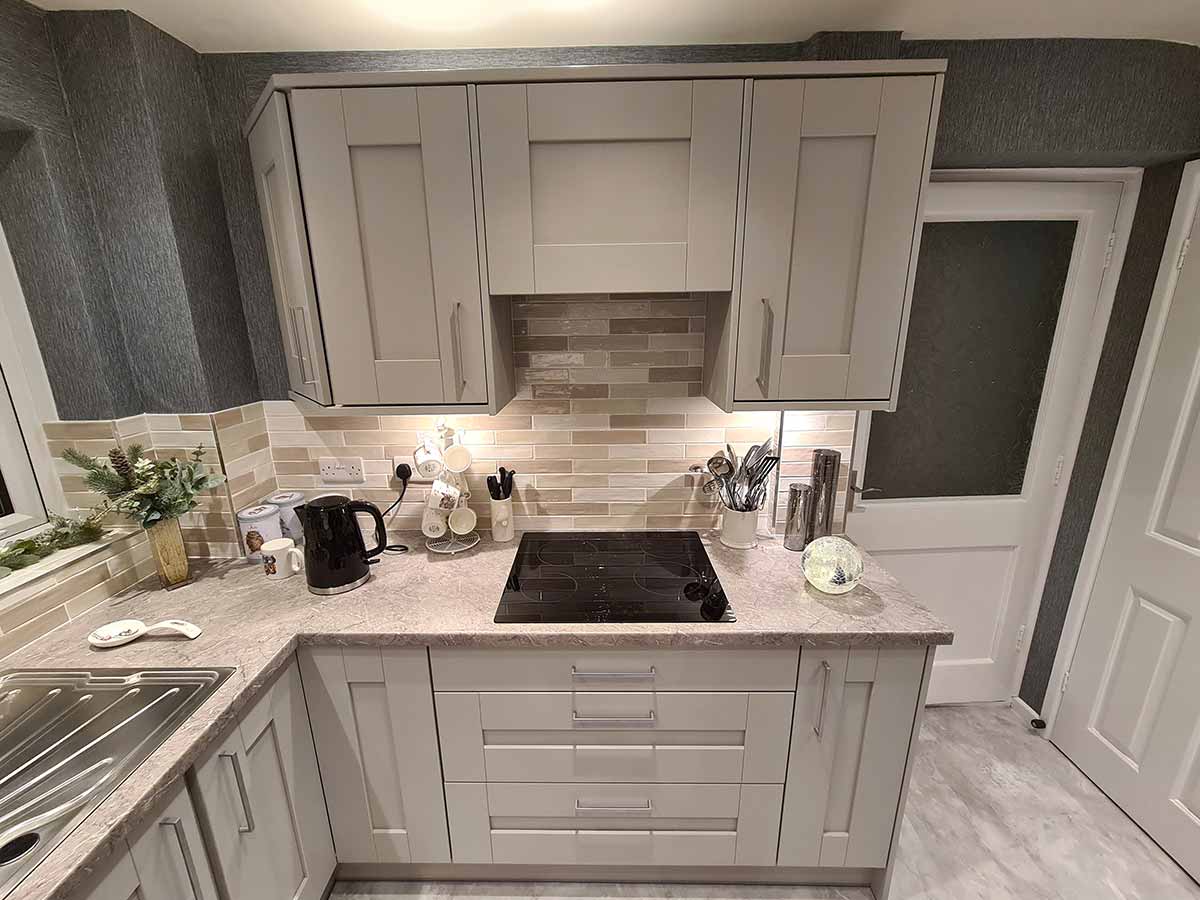 Grey Shaker kitchen with a ceramic hob