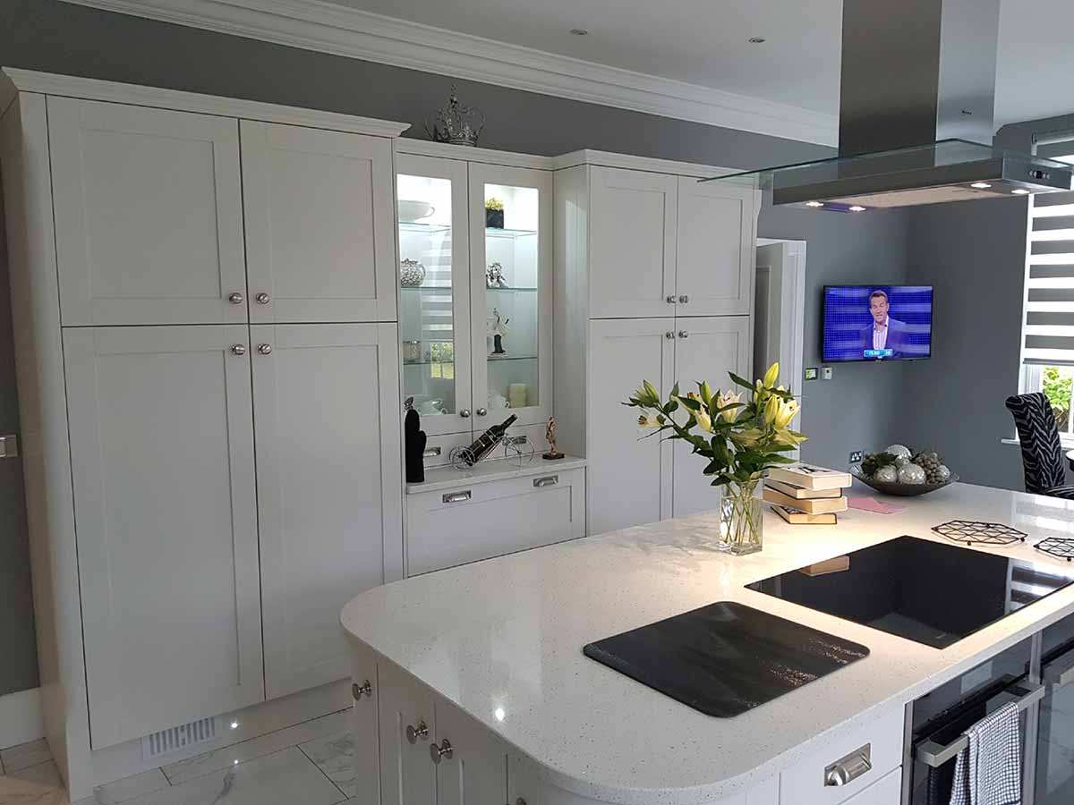 Painted Shaker island with an induction hob